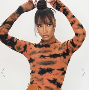 Orange tie dye rubbed knitted funnel neck